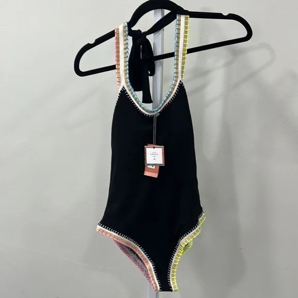 Platinum inspired by Solange Ferrarini Crochet Trim Swimsuit